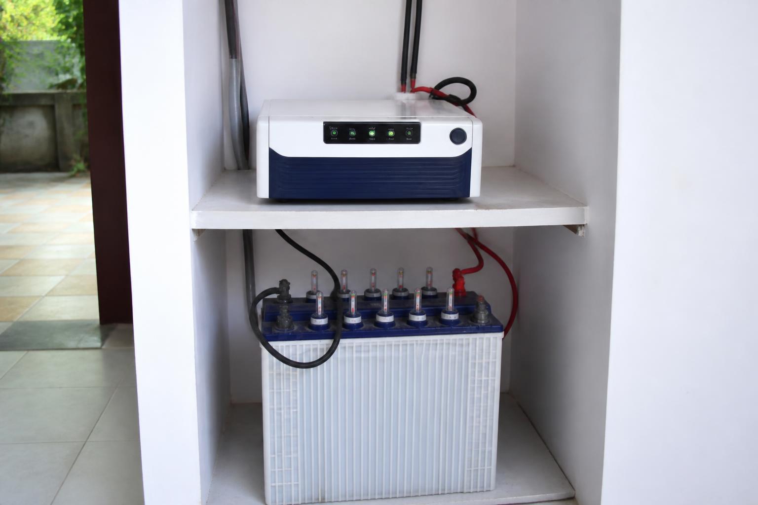Home inverter and battery power backup setup in a clean utility area